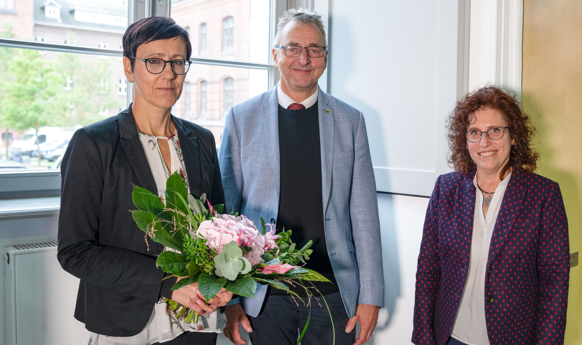 Auf dem Bild sind zu sehen: v.l.n.r. Dr. Juliane Huwe, Prof. Dr. Bornscheuer, Prof. Dr. Katharina Riedel 