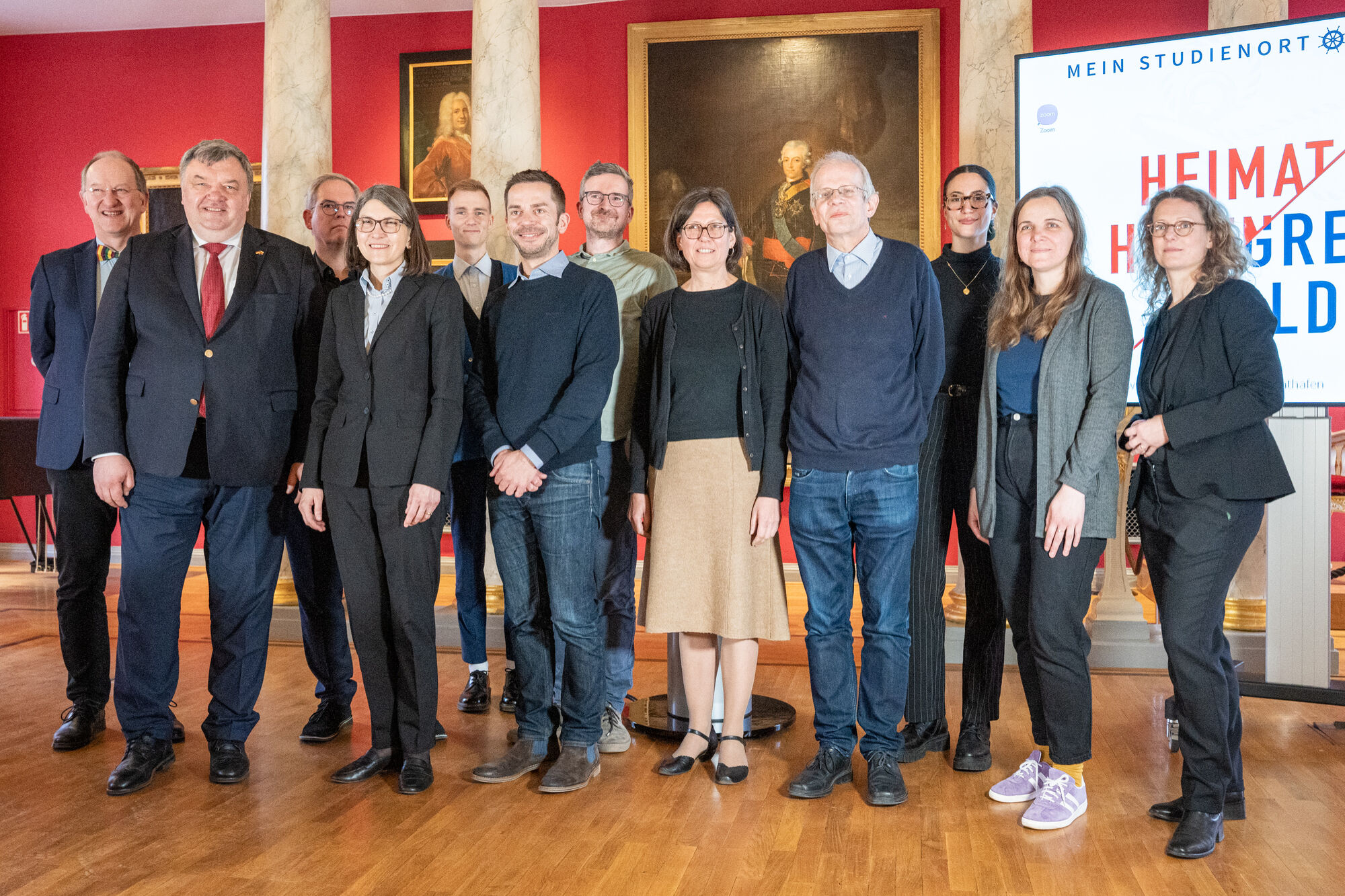 Group of participants from podium discussion with Lithuanian Ambassador in the university's Aula