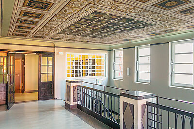 The top floor of the Department of History with its beautifully decorated ceiling.