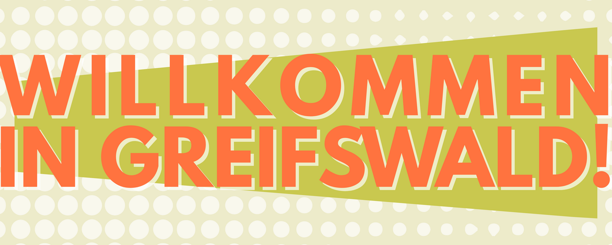 Ein bunter Banner mit der Aufschrift: Willkommen in Greifswald!